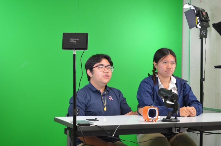On Air: After two weeks of planning and preparation, seniors Megan Bao and Andrew F. Pintor prepare to broadcast an episode.
