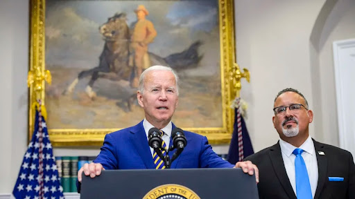 A Helping Hand: President Joe Biden and Education Secretary Miguel Cardona announce plans to cancel student debt in an August press conference.