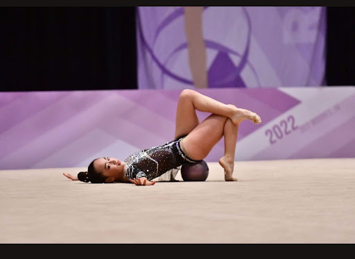 Carol Kim performing her rhythmic gymnastic routine at nationals. 