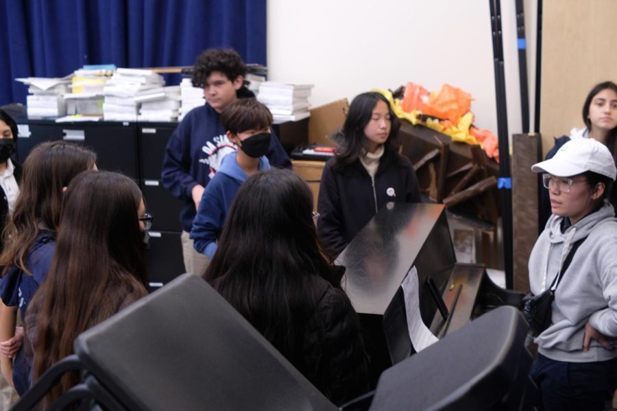 Behind the Spotlight: Preparing for their largest performances since the inception of their club, OA Spotlight rehearse their music after school for the upcoming musical. 