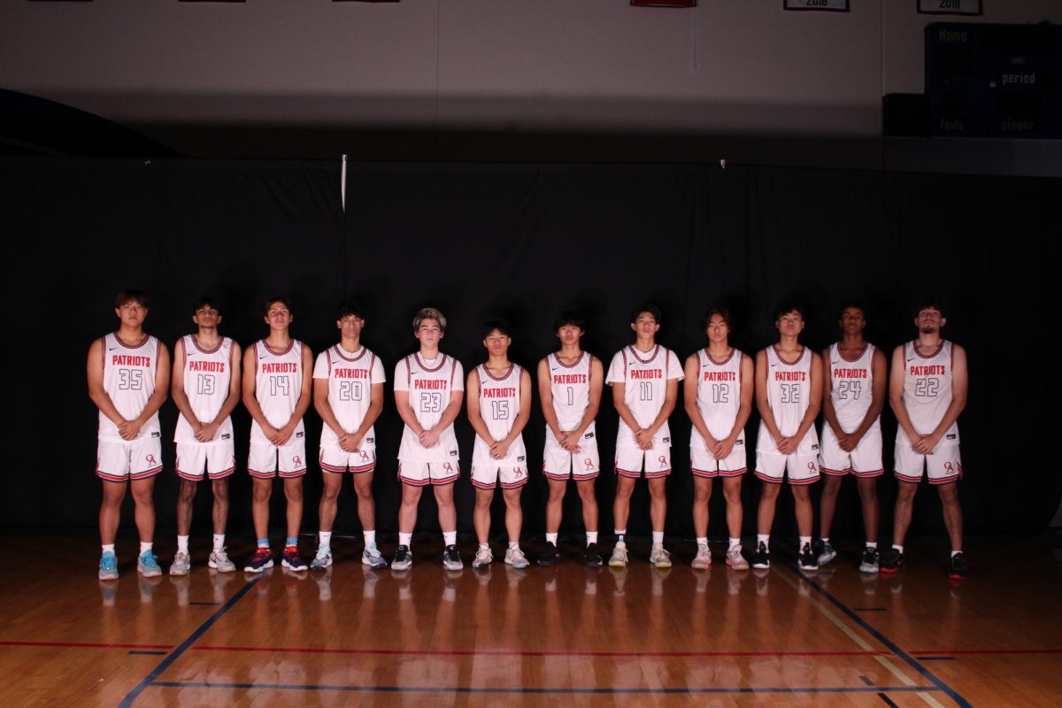 Shooting for Victory: Boys basketball lines up for the shot for their OATV debut. (Photo by Tyler Nguyen)
