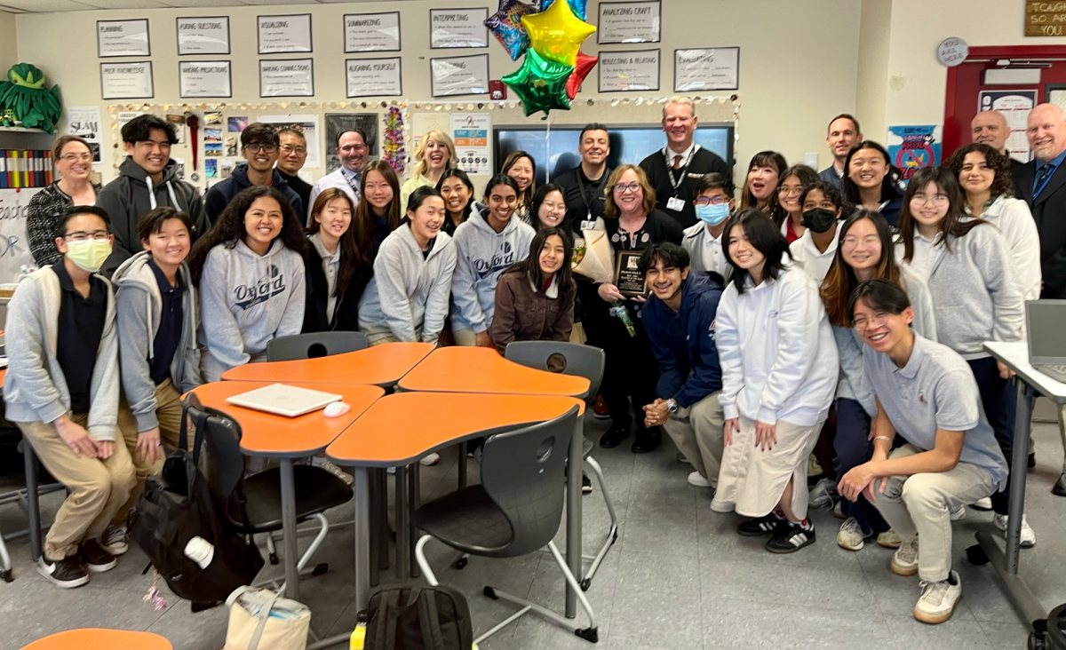 AUHSD+administrators%2C+Oxford+administrators%2C+and+the+Gamut+staff+celebrate+Dr.+Hind%E2%80%99s+recognition+as+AUHSD+Teacher+of+the+Year.+%28Photo+by+AUHSD%2FJohn+Bautista%29