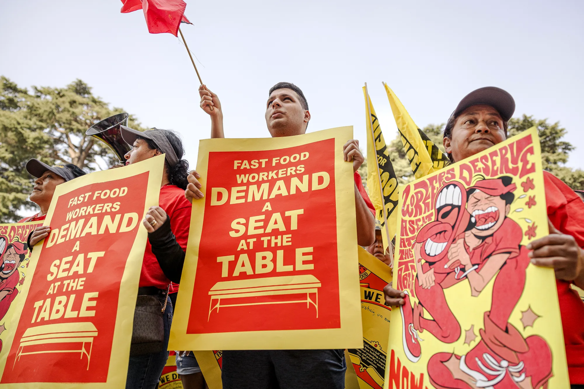 Raising Wages: On Aug. 31, 2023, fast food workers rally about raising wages in Sacramento. Around one month later. Gov. Gavin Newsom signed a law that raises the minimum wage for fast food workers to $20 an hour. (Photo by Rahul Lal for CalMatters)