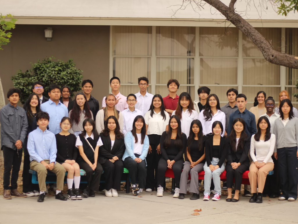 Merging entrepreneurship and kindness: Staff members of Kindset, an AUHSD student-run company, assemble for a group portrait