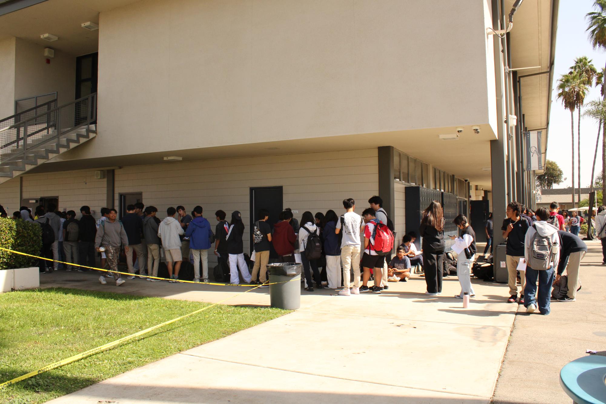 Students brave long lines to pay for AP exams