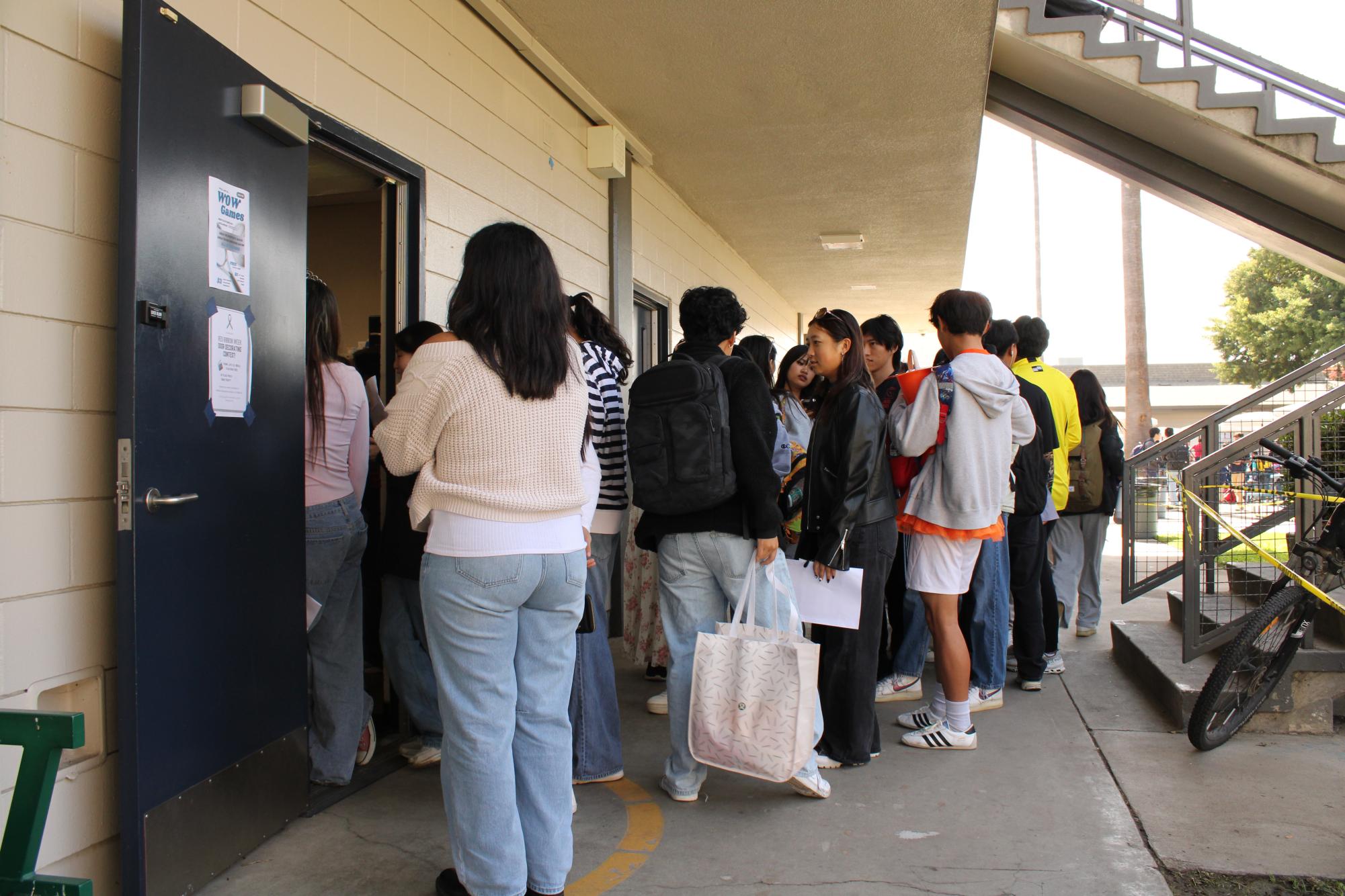 Students brave long lines to pay for AP exams