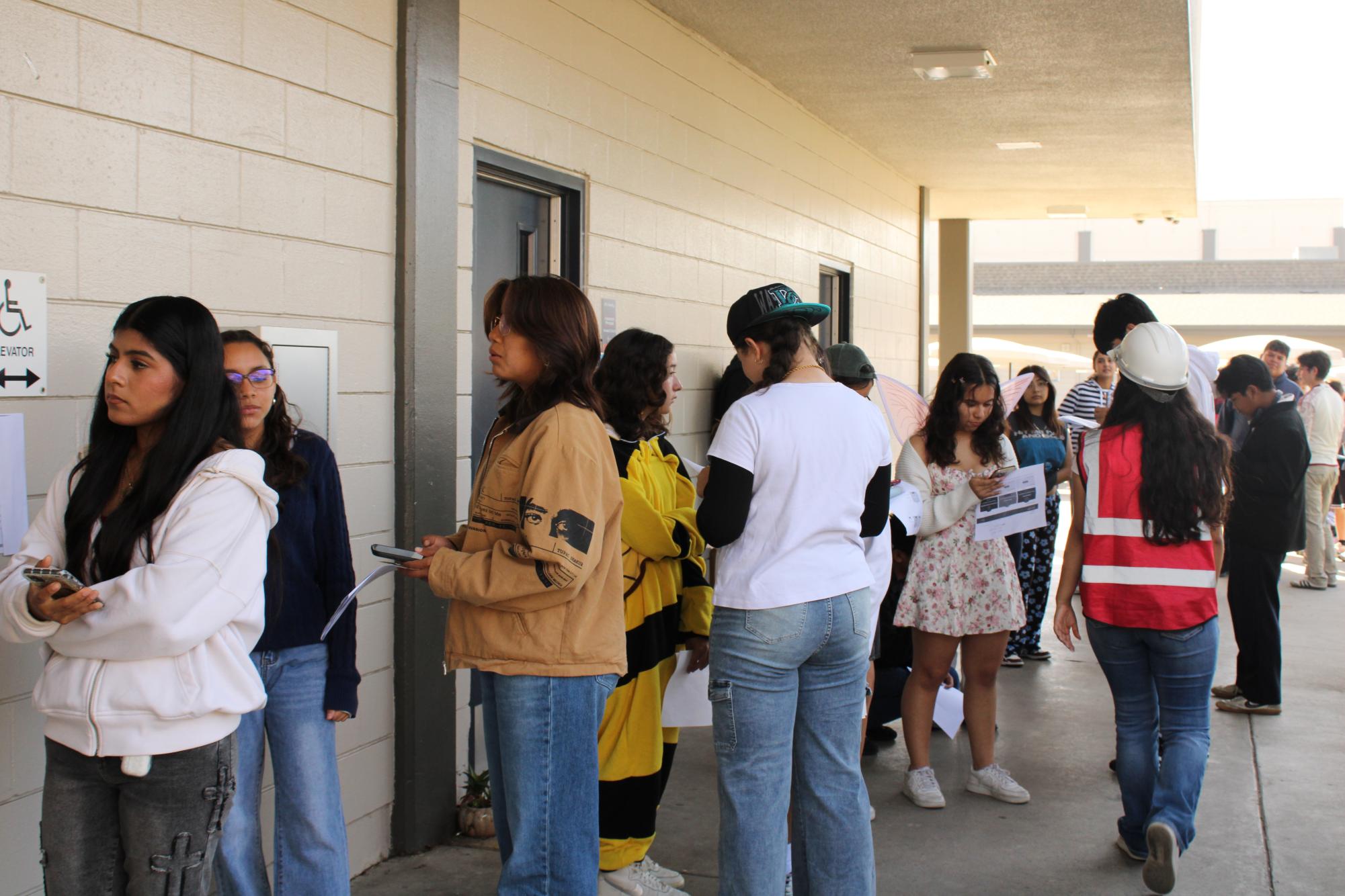 Students brave long lines to pay for AP exams