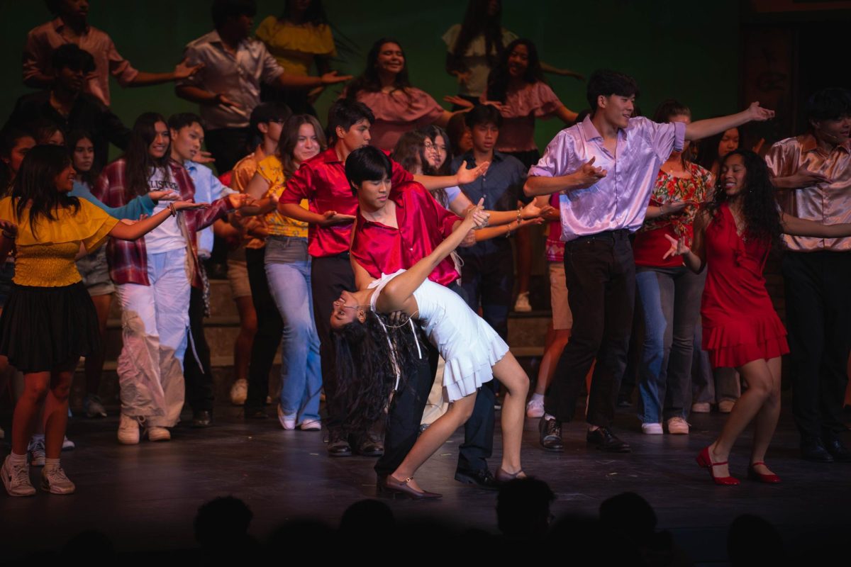 IN THE HEIGHTS: In the climax before the intermission, the residents of Washington Heights dance at the club enthusiastically.