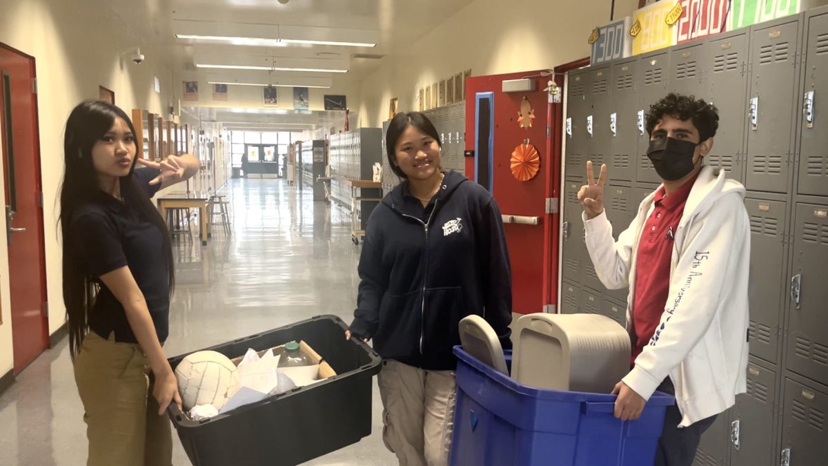 CLEANING UP CAMPUS: Senior Vicky Tran, junior Angelina Lim, and senior Sari Sleem dedicate 8th period to repurposing waste, from plastic bottles to volleyballs.