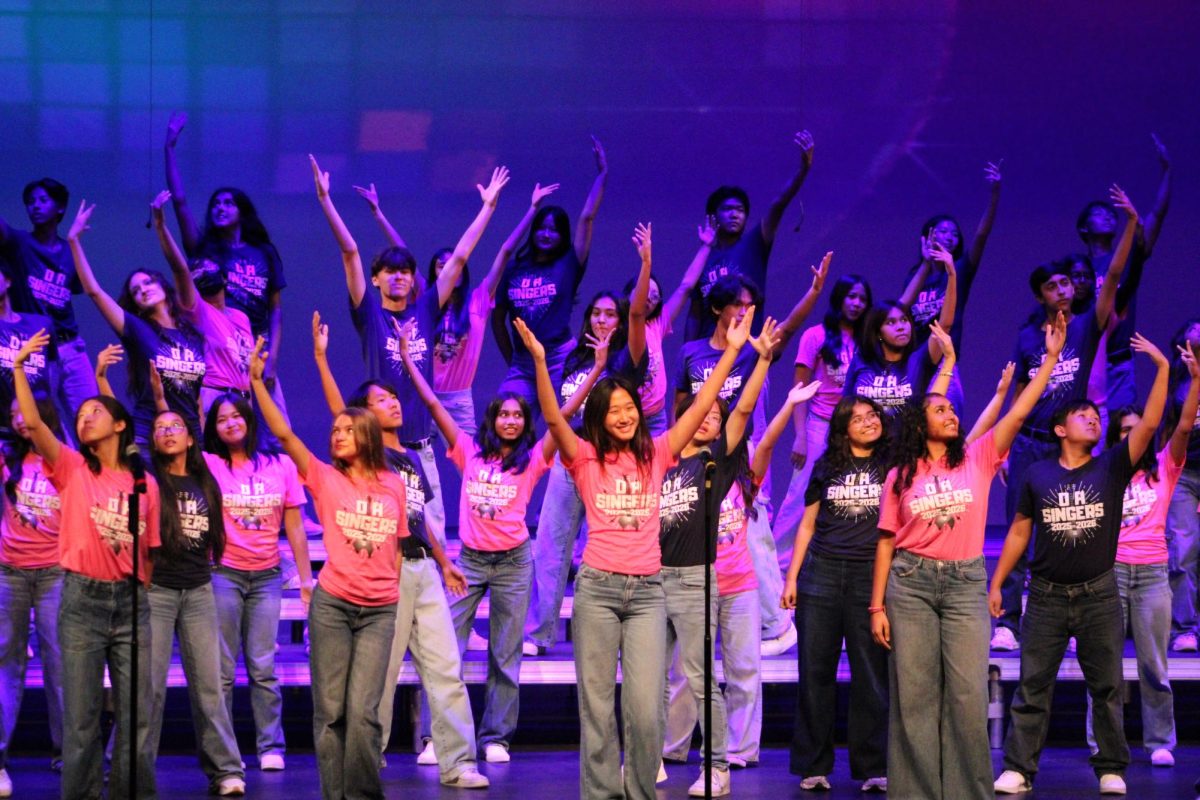 REACHING OUT: Show Choir and Advanced Girls collaborate to perform their song together