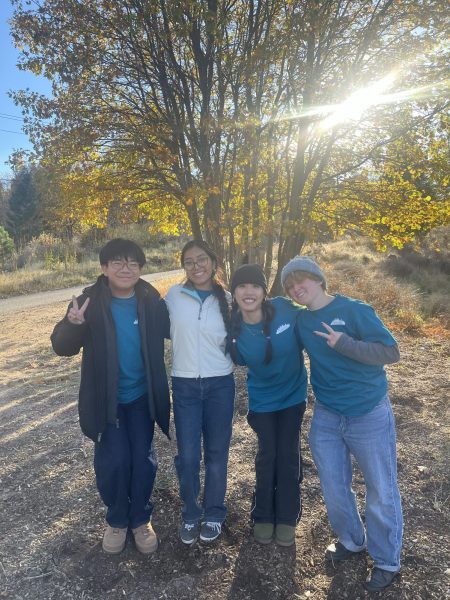 TEAM BONDING: (from left to right) Forestry Challenge team Aidan Vo (12), Cecilia Baltazar (12), Elena Foong (12), and Lee Littler (12) pose for a photo together shortly after completing their survey of the land for their final presentation. (Photo courtesy of Forestry team)