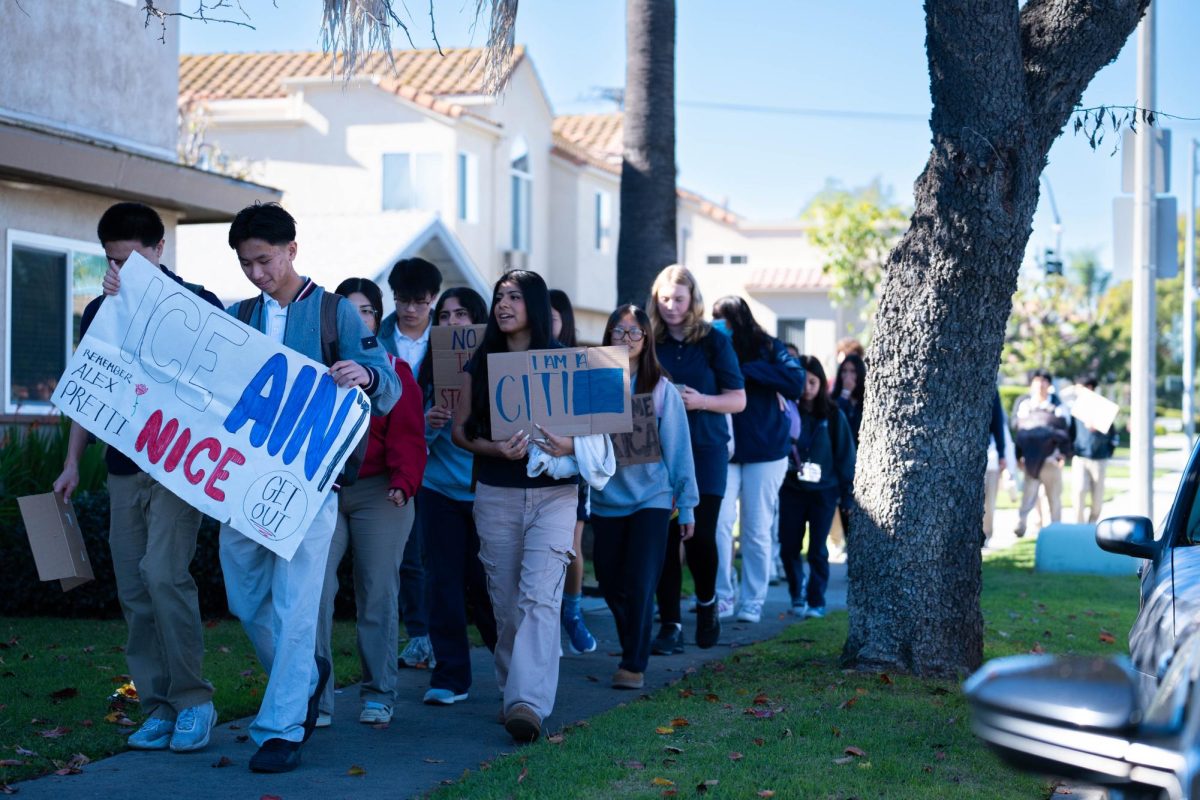 STUDENTS WALK OUT: Oxford students protest down Orange Avenue on the way to Cypress High School.