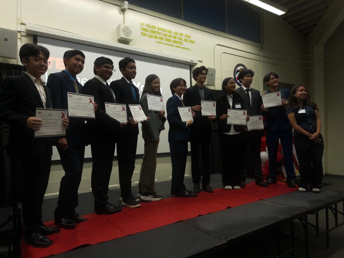 SHARING VOICES: Speakers at the TEDxKennedy hold certificates of completion. (Photo courtesy of Kaela Suan)