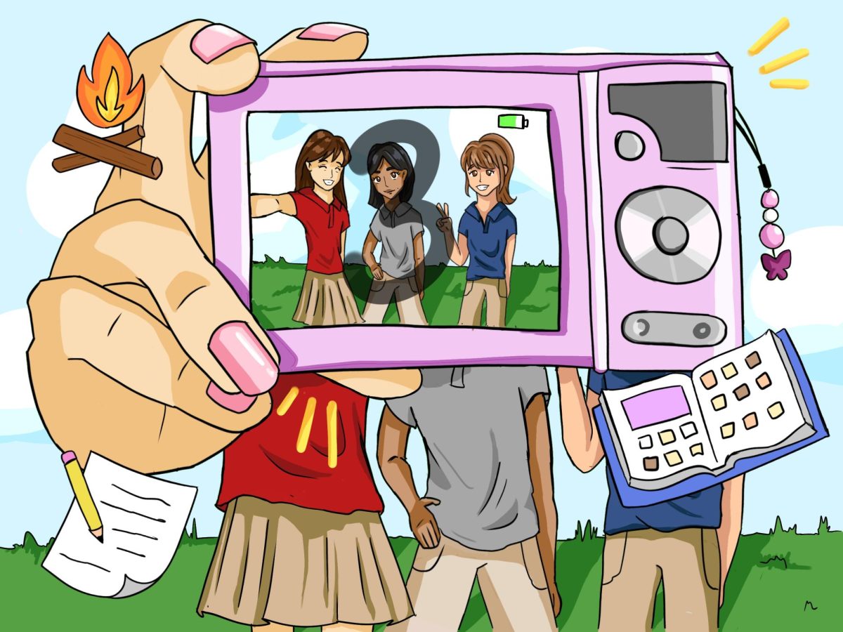 SAY CHEESE: Students take a final selfie of themselves for the school year, dressed in their polos and uniform bottoms.